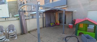 Toldo extensible beige y gris
