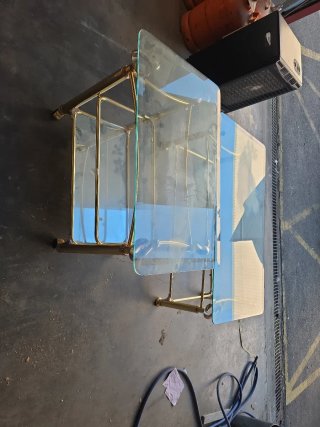 Mesas de centro cristal y metal dorado