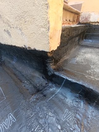 Colocador de tela asfáltica