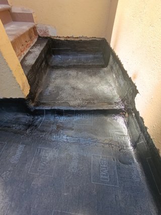 Colocador de tela asfáltica