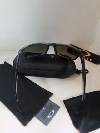 Gafas Oakley grises transparentes y azules