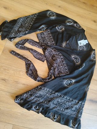 Blusa manga murciélago con estampado Om