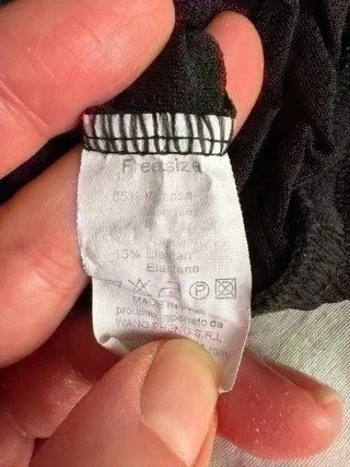 Pantaloni neri a costine vita alta