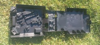 Caja para herramientas de rueda de repuesto