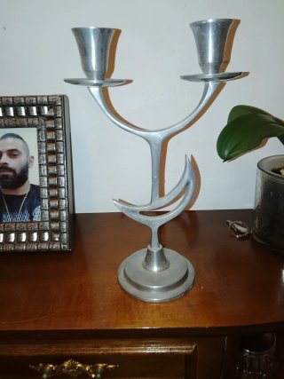 Candelabro de metal plateado