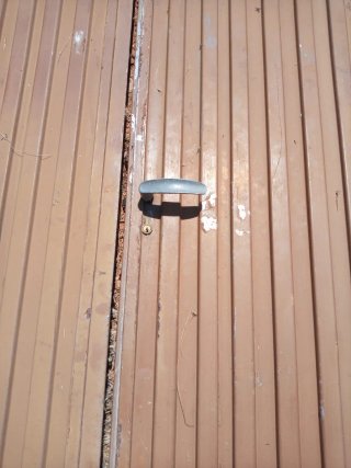 Puerta hierro cochera 4 hojas abatible