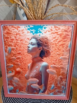 Cuadro salmón chica entre peces