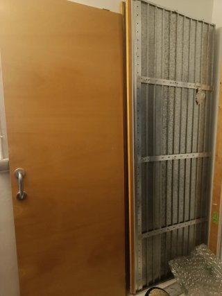 Puerta corredera empotrada madera