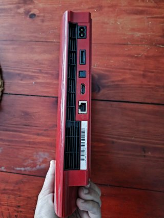 Playstation 3 Roja + Lote Juegos y dos mandos