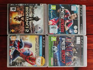 Playstation 3 Roja + Lote Juegos y dos mandos