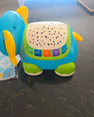Elefante musical de proyección para bebés