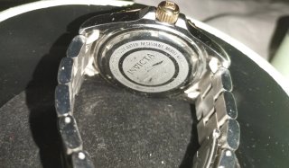 Reloj Invicta Oro y Plata