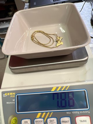Cadena de oro con diamante