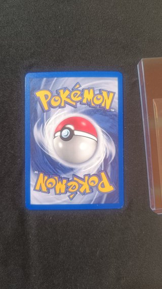 NM Lt. Surge's Raichu Gym Holo Carta Pokemon PSA