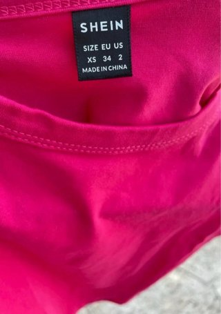 Top rosa SHEIN sin mangas