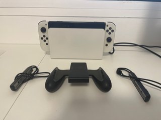 Nintendo Switch OLED + Juegos