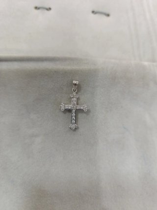 Cruz oro blanco 18k con circonitas