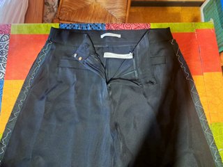 Pantalón Uterqüe anchos con detalles flecos