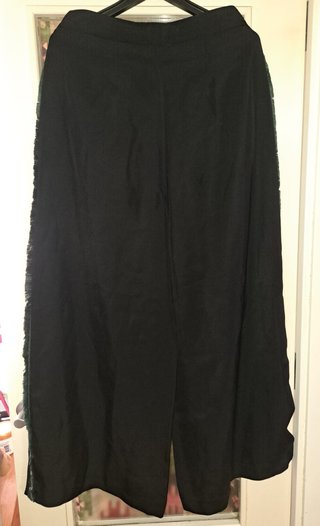 Pantalón Uterqüe anchos con detalles flecos