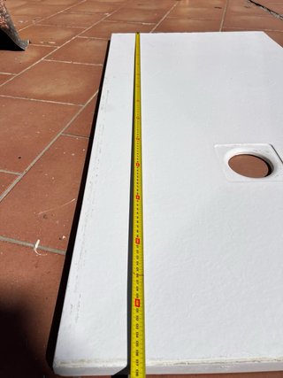 Plato de ducha blanco usado con desague