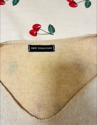 Camiseta beige manga 3/4 con detalles dorados