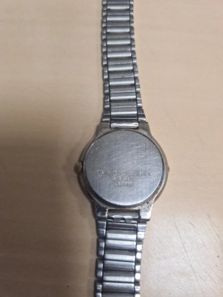 Reloj Lotus Oro y Plata