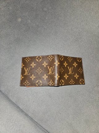 Portafoglio Louis Vuitton vintage in pelle marrone