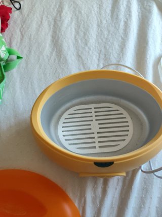 Dispensador de parafina beige y naranja