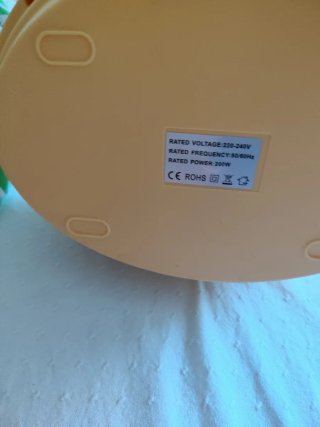 Dispensador de parafina beige y naranja