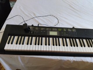 Teclado Casio 100 Tonos y Ritmos