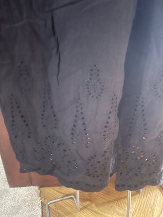 Mono negro bordado talla S , pero vale para una M