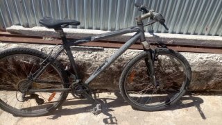 Bicicleta de montaña gris ROCKRIDER