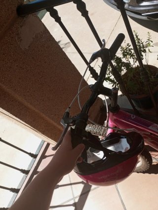 Bicicleta rosa infantil