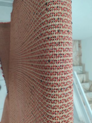 Alfombra roja de tela