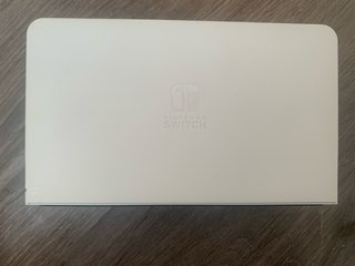 Nintendo Switch OLED + Mario Kart 8 Deluxe