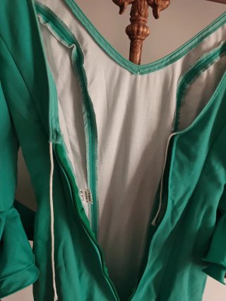 Traje de flamenca verde con volantes