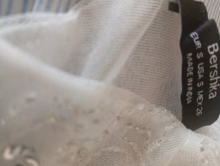 Top Bershka lentejuelas blanco y plata