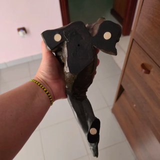 Figura mujer sentada