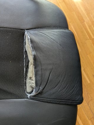 Silla de oficina negra con base rota