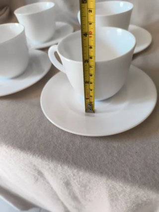 Seis tazas de café con leche de porcelana