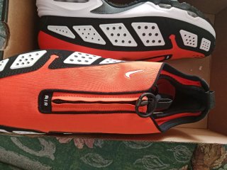 Zapatillas Nike Air Max Tavas naranjas y Negras