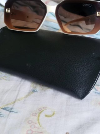 Gafas de sol Gucci blancas y marrones