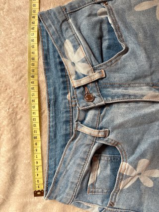 Pantalón vaquero niña flores blancas