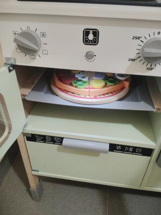 Cocina de madera infantil con accesorios