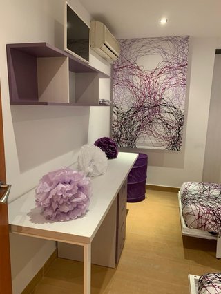 Habitación juvenil con dos camas