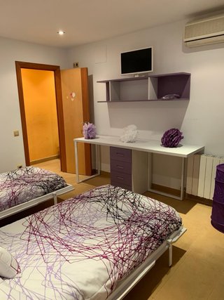 Habitación juvenil con dos camas
