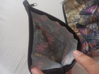 2 Neceser con estampado de mariposas