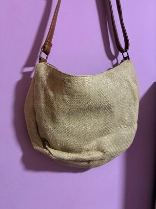 Bolso de tela con monedas y espejos