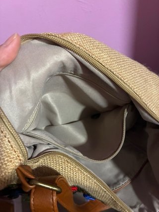 Bolso de tela con monedas y espejos