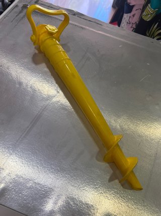 Soporte para sombrilla amarillo